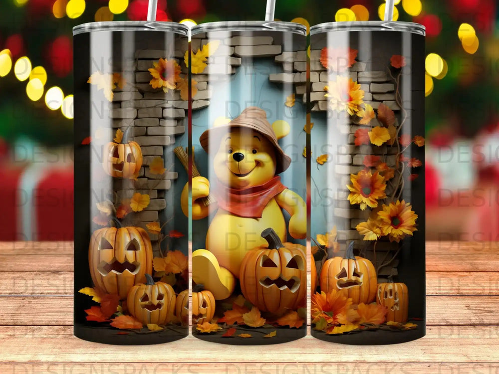 Winnie the Pooh with pumpkins and autumn leaves on a tumbler.