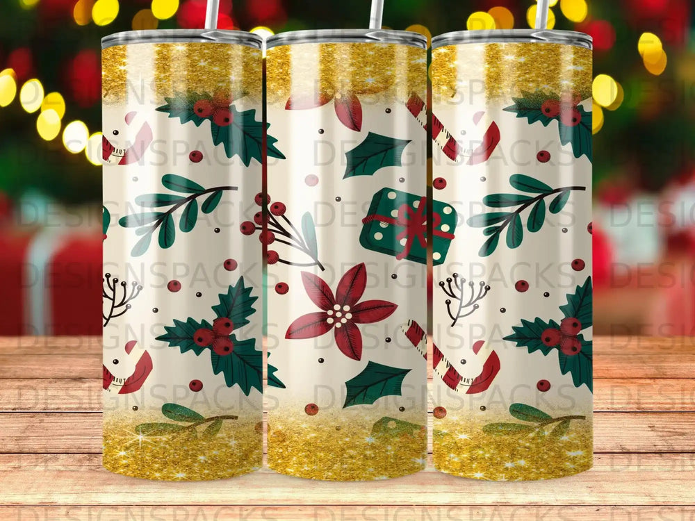 Gold glitter tumbler with red holly, poinsettias, and candy canes.