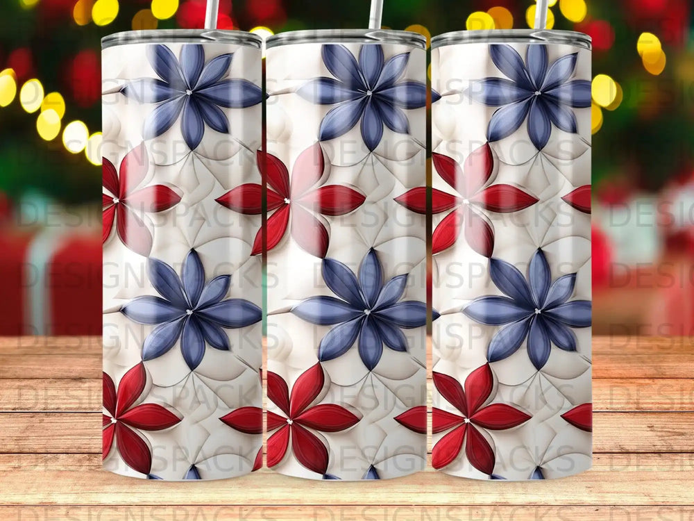 Three tumblers with red and blue flower pattern and wood grain background.