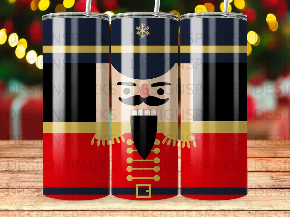 Nutcracker illustration with gold accents on a red and black cylindrical tumbler.
