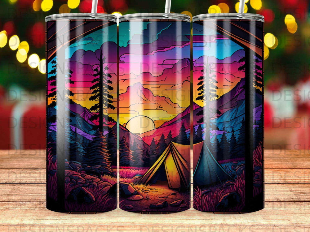 Tent in colorful mountain landscape at sunset with trees.