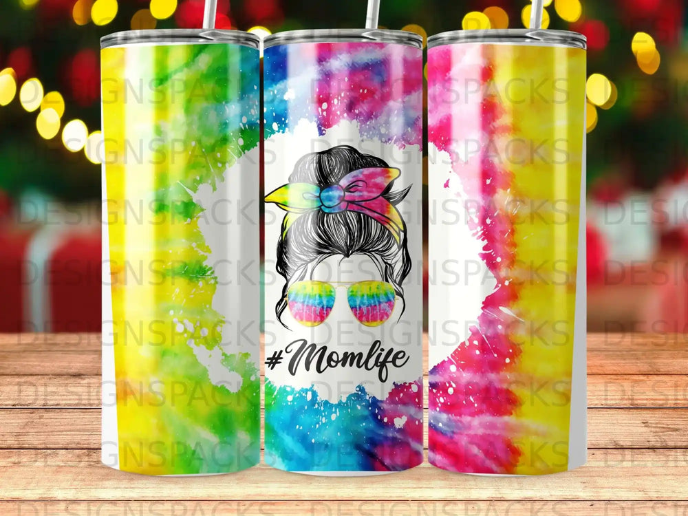 Three tumblers with colorful abstract paint splatters and "Momlife" text.