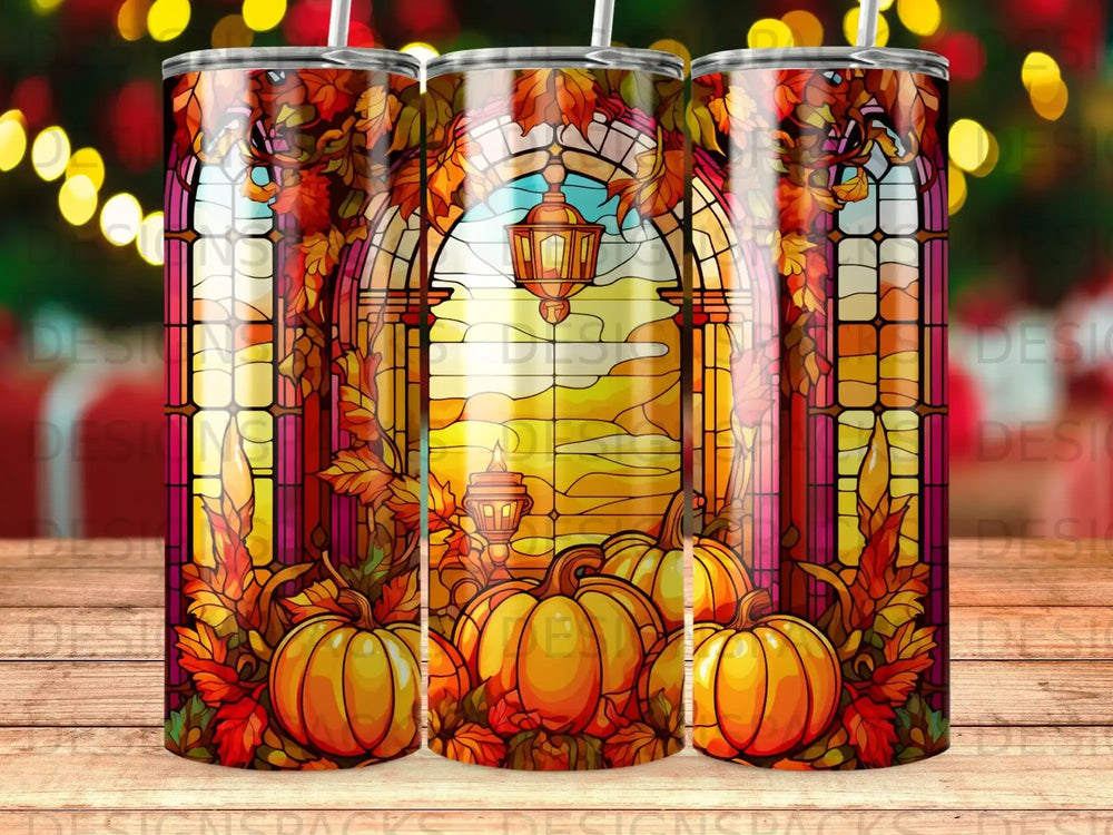 Autumn stained glass window with pumpkins and autumn leaves.
