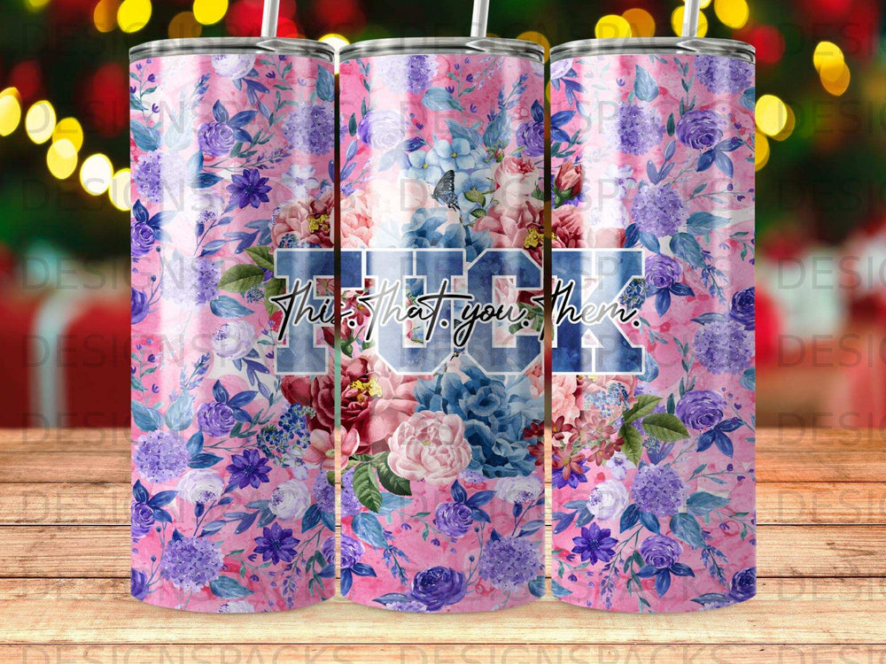 Floral tumbler with "The That. You. Them." text across it.