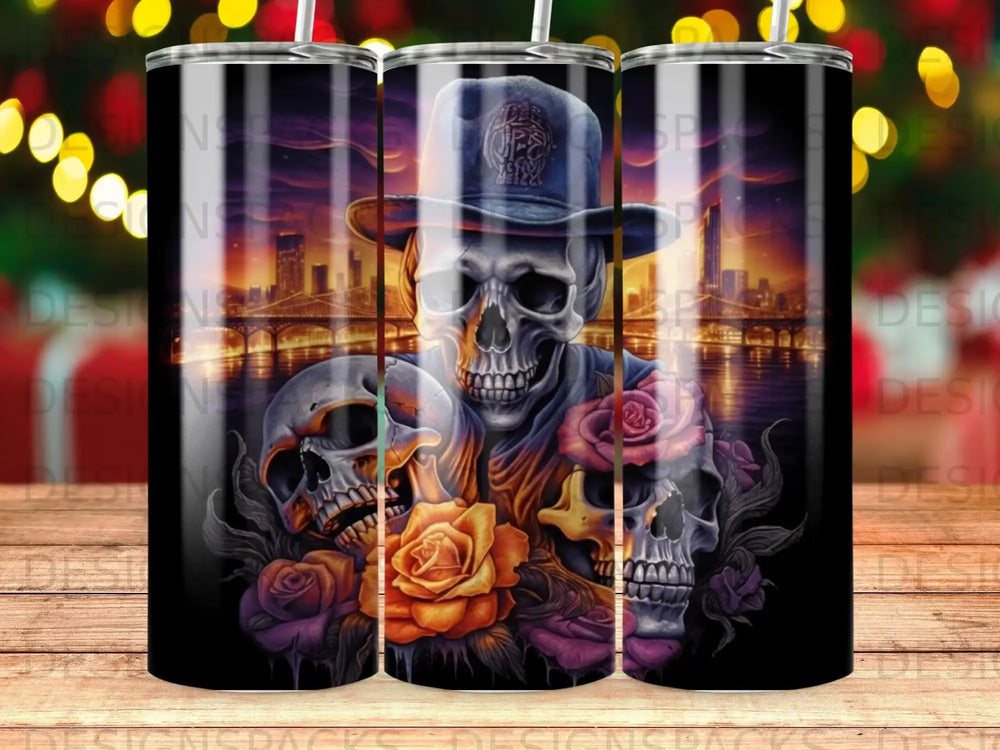 Skull and roses artwork on a tumbler with city skyline and bridge background.