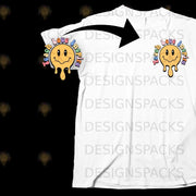 White t-shirt mockup with a graphic of a dripping smiley face reading "Teach Love Inspire".