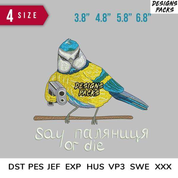 Embroidery design of a blue tit bird holding a camera with 'Say ПАЛЯНИЦЯ or die' text, available in 4 sizes and multiple formats.