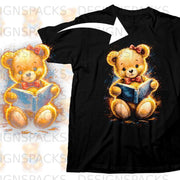 Teddy bear wearing a bow tie and hair bow, reading a book on a black t-shirt.