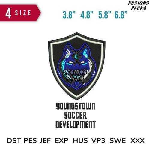 Embroidery design of a glowing blue wolf in shield for Youngstown Soccer Development, available in multiple sizes and formats.