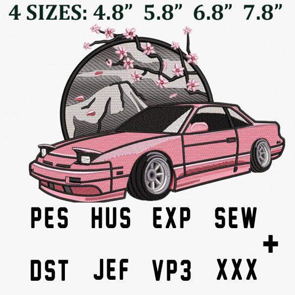 Pink JDM car embroidery design with cherry blossom mountain backdrop, 4 sizes, PES HUS EXP SEW DST JEF VP3 XXX formats